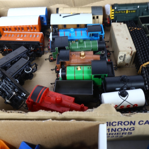 219 - A quantity of various OO gauge trains, carriages, goods wagons and other associated accessories, inc... 