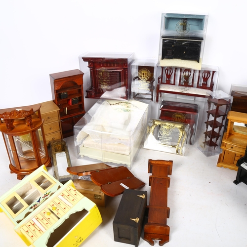 229 - THE DOLL'S HOUSE EMPORIUM - a quantity of doll's house furniture, including a boxed Tudor style 4-po... 