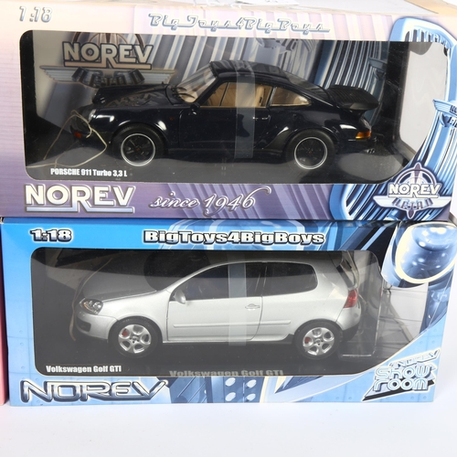 23 - NOREV - a group of 1:18 scale diecast models, all in original boxes and on associated display stands... 