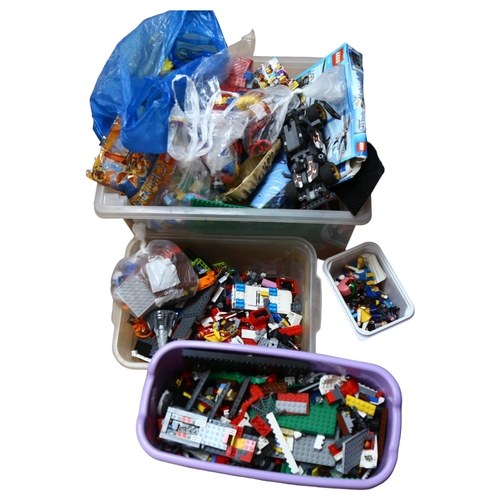 243 - LEGO - a large quantity of loose LEGO building blocks, accessories and figures, and some Playmobil f... 