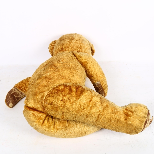 244 - A Vintage teddy bear, unmarked, no maker's labels, H75cm