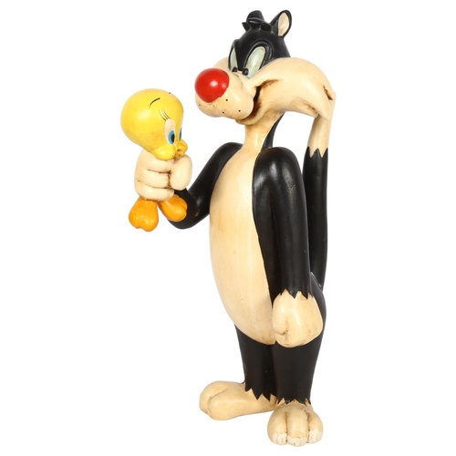 250 - A Vintage Warner Brothers composite statue of Sylvester The Cat holding Tweety bird around the body/... 