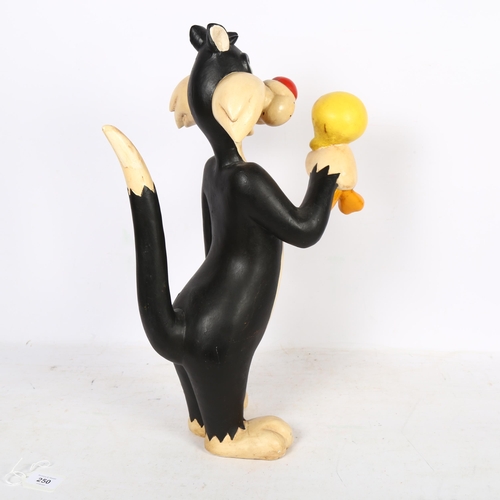 250 - A Vintage Warner Brothers composite statue of Sylvester The Cat holding Tweety bird around the body/... 