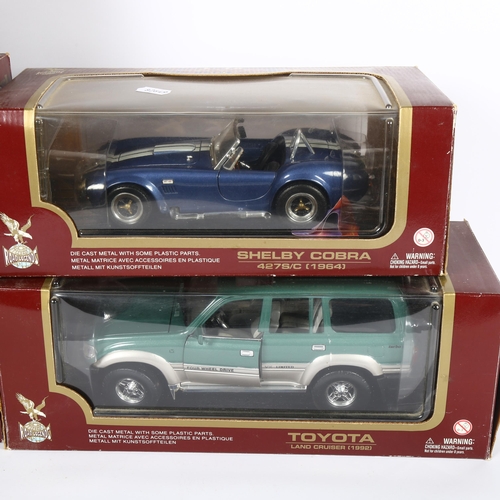28 - ROAD LEGENDS - a quantity of 1:18 scale diecast models, in original boxes with associated display st... 