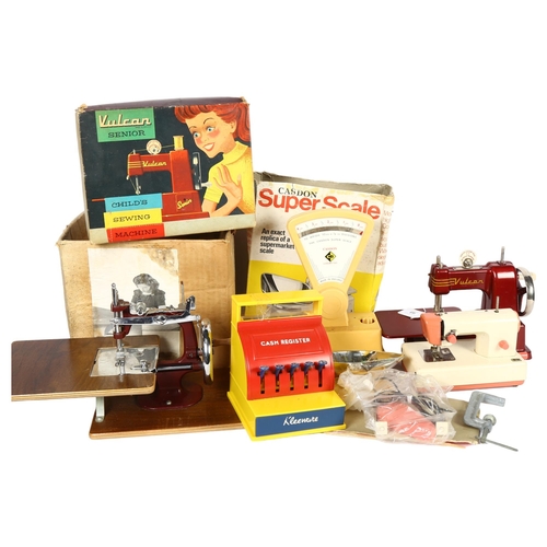 48 - A Vulcan Senior child's sewing machine, 1950s, in original box with associated instructions and some... 
