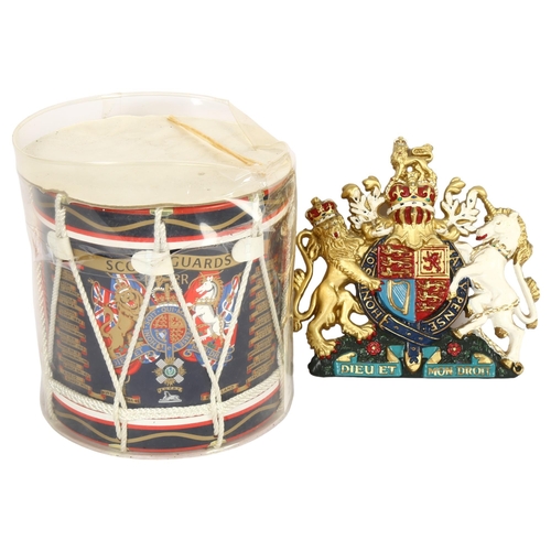 53 - SCOTS GUARDS - an insulated ice bucket, in the shape of a Scots Guards drum, and a fibreglass coat o... 