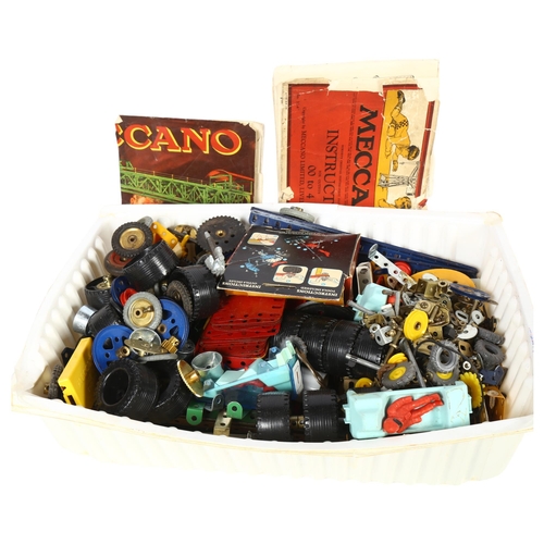 61 - MECCANO - a quantity of Meccano parts, accessories, and instruction manuals