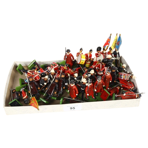 95 - THE WILLIAM BRITAINS COLLECTORS CLUB - a group of freestanding metal figures, including various marc... 