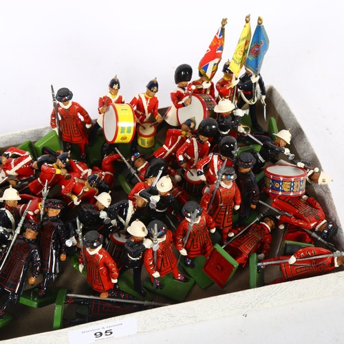 95 - THE WILLIAM BRITAINS COLLECTORS CLUB - a group of freestanding metal figures, including various marc... 