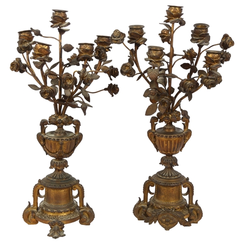 266 - A pair of 19th century gilt-bronze table candelabras, each having 5 floral decorated spray arms on c... 