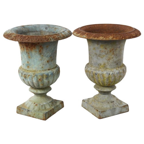 269 - A pair of small cast-iron Campana urns on square bases, H23.5cm