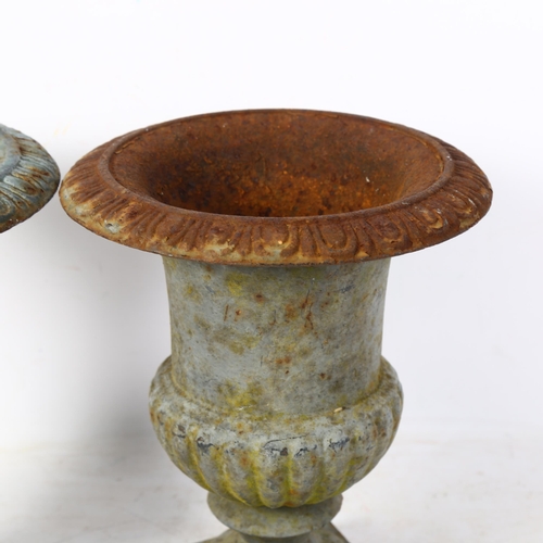 269 - A pair of small cast-iron Campana urns on square bases, H23.5cm