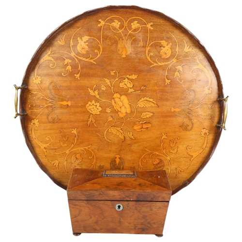 277 - A Victorian mahogany and marquetry decorated circular serving tray with brass handles, and a mahogan... 