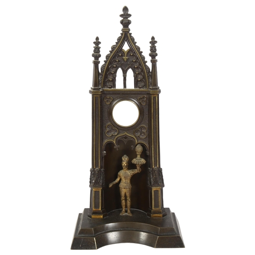 290 - A cast-brass Gothic design pocket watch stand, with a figure in a plumed hat, H39cm