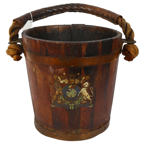 300 - A 19th century Naval fire bucket with leather-clad rope twist handle, H31cm