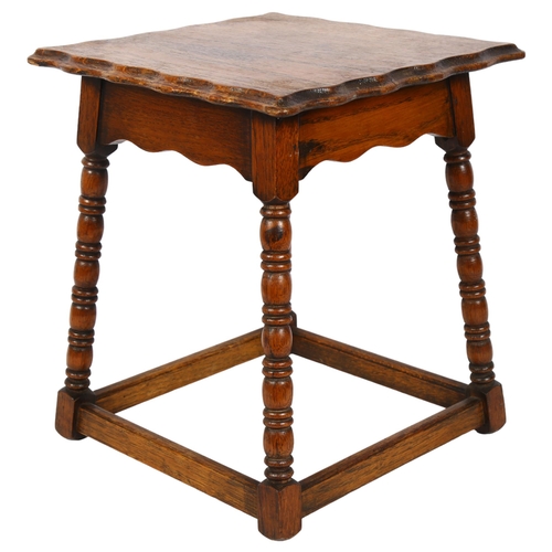 301 - A small oak occasional table, with shaped edge on ring turned legs, 26cm x 31cm