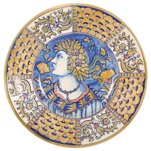 302 - An Italian Maiolica charger, with figural painted decoration, diameter 41.5cm