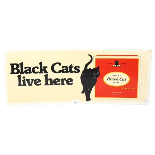 313 - A Black Cats Live Here advertising sign, 28 x 70cm, in perspex