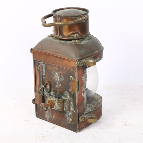 318 - A Victorian copper ship's masthead lantern with swing handle, H22cm