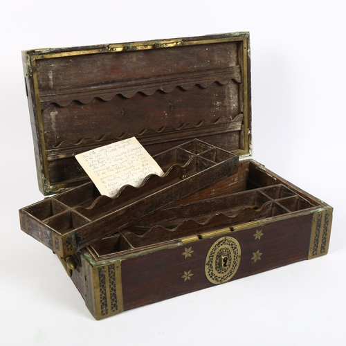 343 - A 19th century Anglo-Indian teak and brass-bound travelling stationery/writing box, with brass carry... 