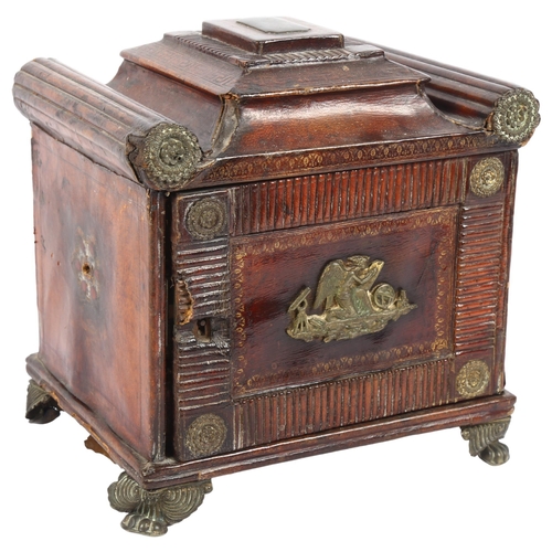 351 - A Regency tooled leather-covered sarcophagus design jewellery box, the door opening to reveal 3 fitt... 