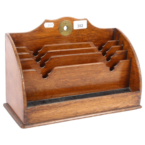 352 - An early 20th century oak letter/stationery rack, W31cm