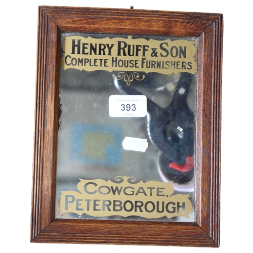 393 - Henry Ruff & Son Complete House Furnishers, a small oak-framed advertising mirror, 19 x 24cm