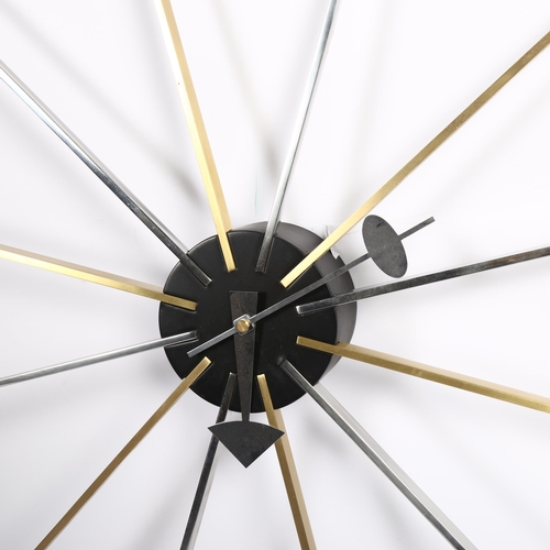 395 - A mid-century design starburst clock, with solid chrome brass arms and stylised hands, diameter 61cm