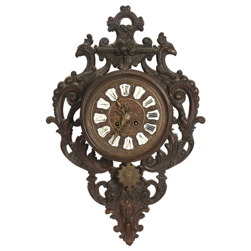 396 - A Black Forest Gothic design wall clock, with a cast-brass griffon mounted surround, 8-day movement,... 