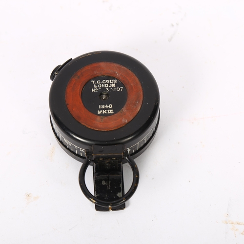 419 - T.G. Company Ltd London, a Second World War military compass, no. 39307, dated 1940, MkII