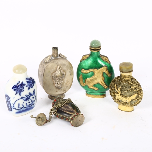 425 - A group of Oriental snuff bottles, including blue and white, resin study, white metal etc (3)