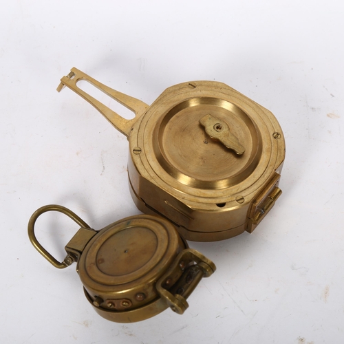 441 - A reproduction brass-cased compass and another (2)