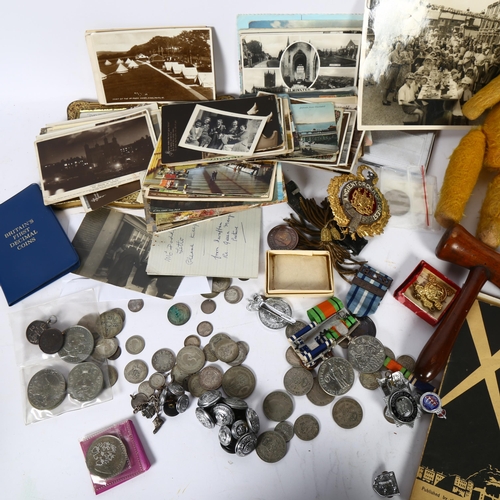 453 - A group of interesting items, including badges, postcards including 1 of Queen Mary leaving the Foun... 