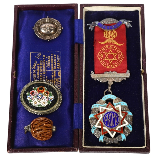 454 - A silver and coloured enamel Grand Council Primo badge, in original leather case, presented to Broth... 