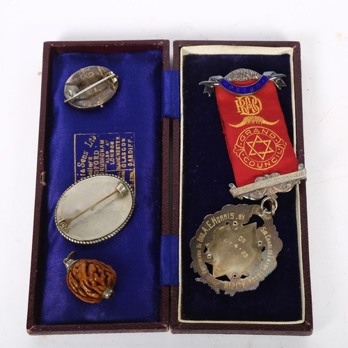 454 - A silver and coloured enamel Grand Council Primo badge, in original leather case, presented to Broth... 