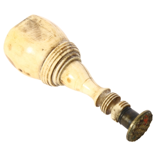 466 - A 19th century 2-section bone seal, L8.5cm