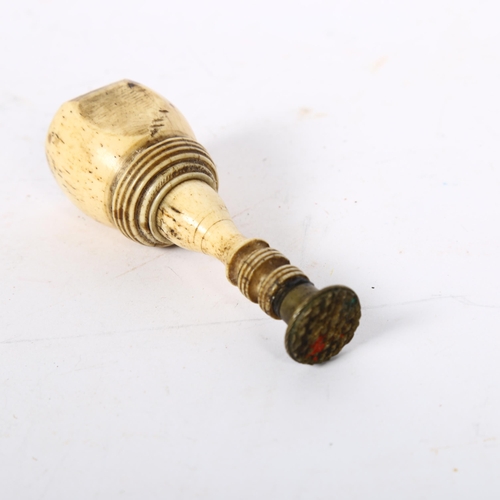 466 - A 19th century 2-section bone seal, L8.5cm