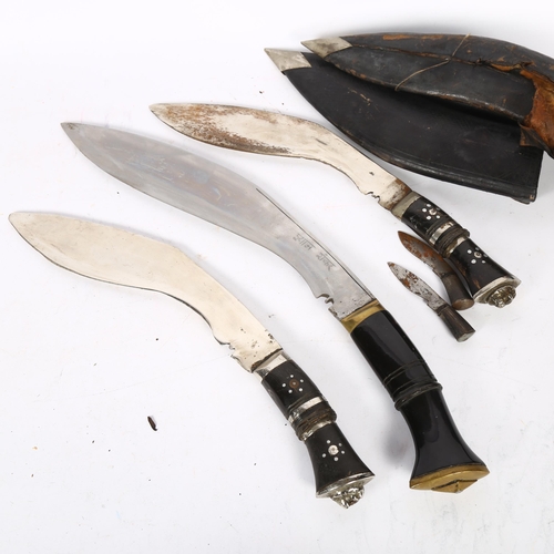 474 - A similar pair of Indian kukri knives, with horn handles, 1 having its 2 smaller knives in leather s... 