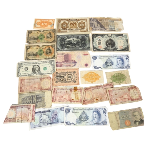 478 - A collection of worldwide banknotes, including Saudi Arabia, Cayman Islands one dollar etc