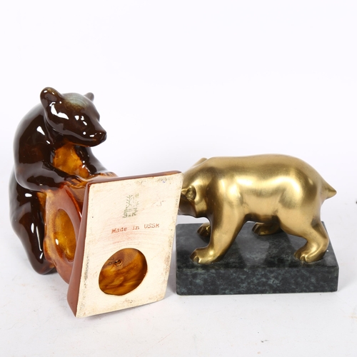 480 - A Russian Konakovo Majolica bear with 3NK mark to the base, H14cm, and a bronze bear desk weight on ... 