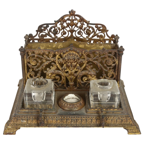 504 - An Antique gilt-brass desk stand, with fitted letter rack and 2 inkwells (inkwells not original), W2... 