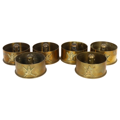 510 - A set of 6 trench art ashtrays, with central burners, diameter 10cm (6)