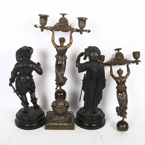 514 - A pair of cast spelter cavalier figures on turned wood stands, H29cm, and a pair of cast-brass table... 