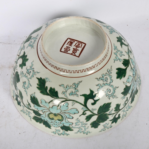 527 - A large Chinese green enamelled and prunus decorated centre bowl, diameter 30cm