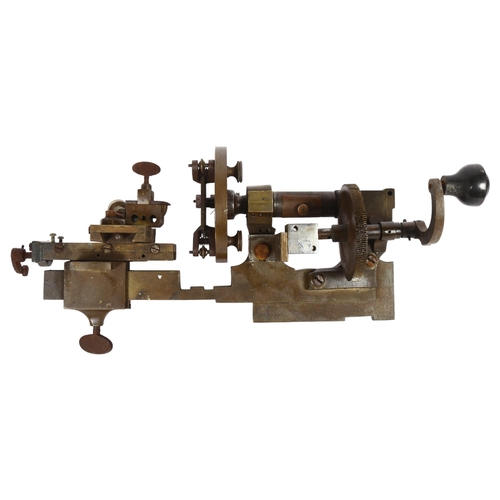 534 - A 20th century bronze watchmaker's hand turned lathe, L42cm