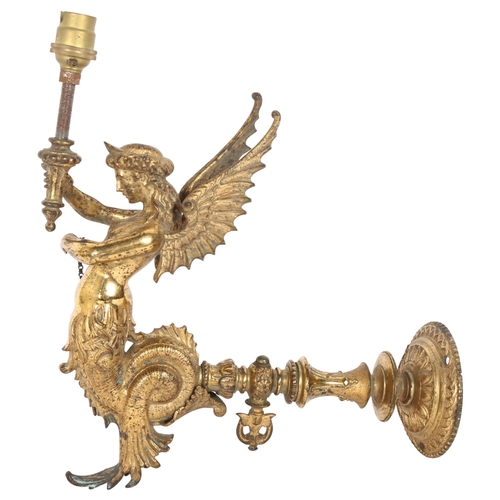 536 - An Antique gilt-bronze seraphim wall sconce, height to top of bayonet fitting 35cm, overall length 2... 