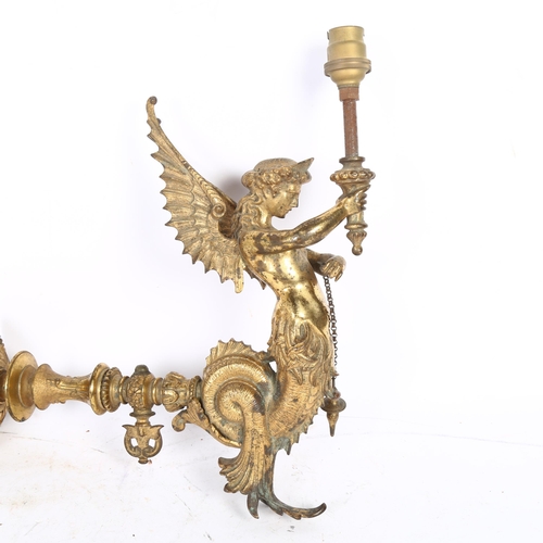 536 - An Antique gilt-bronze seraphim wall sconce, height to top of bayonet fitting 35cm, overall length 2... 