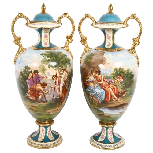 542 - A pair of early 20th century Continental urns and covers, with transfer printed panels and gilded de... 