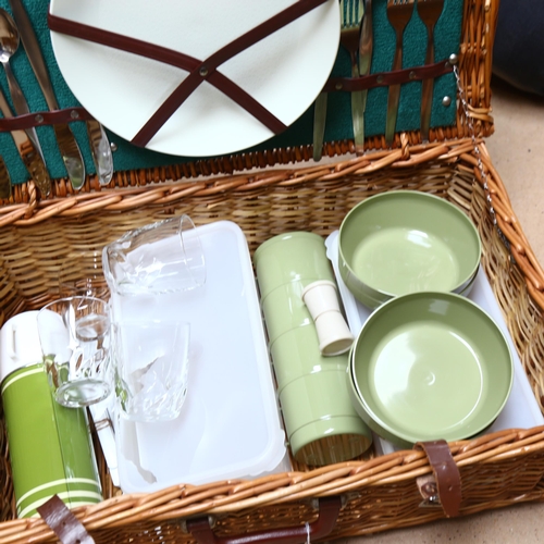 550 - A wicker picnic hamper and contents