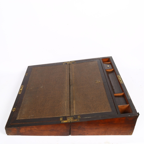 583 - A Regency walnut and brass-bound travelling writing slope, L50cm, H17cm, D26cm